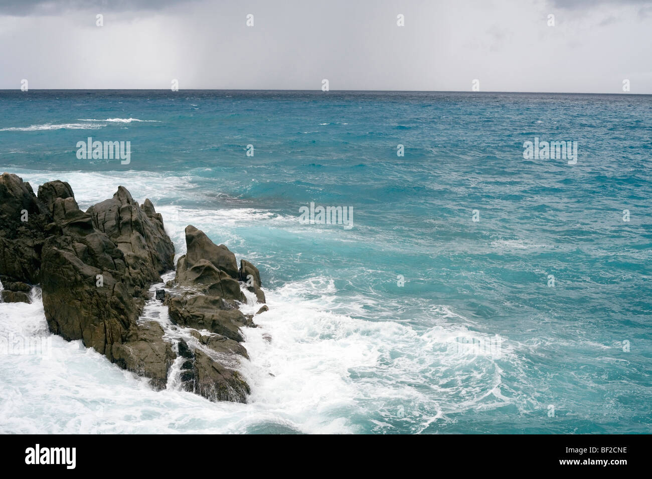Stormy tropical sea off coast of Mahe, Seychelles Stock Photo