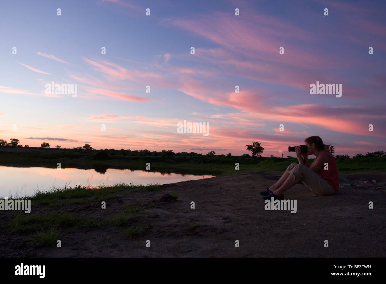 Man sitting on lake hi-res stock photography and images - Alamy