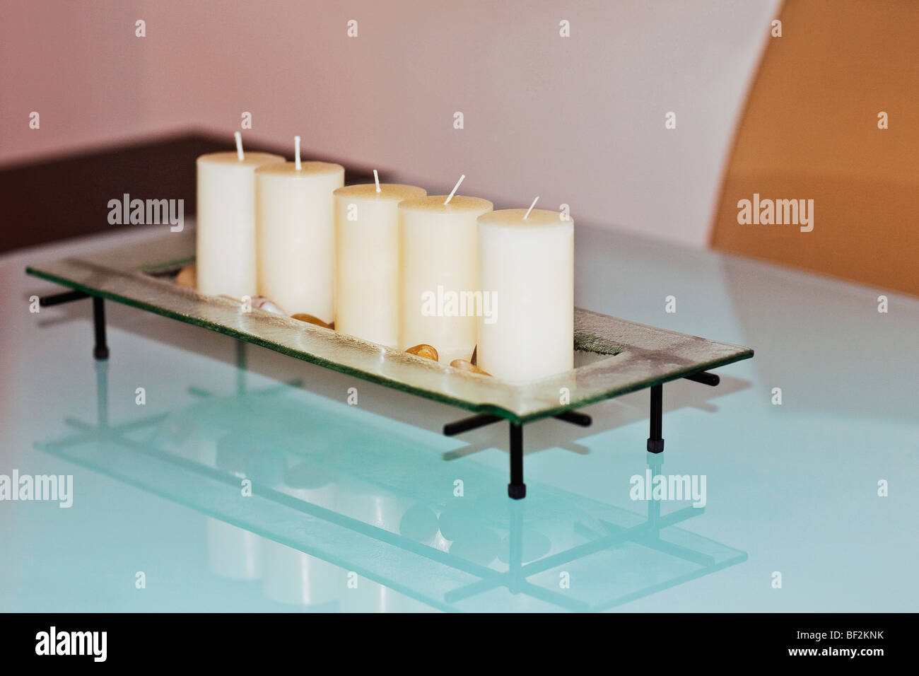 Candles in a candle stand Stock Photo Alamy