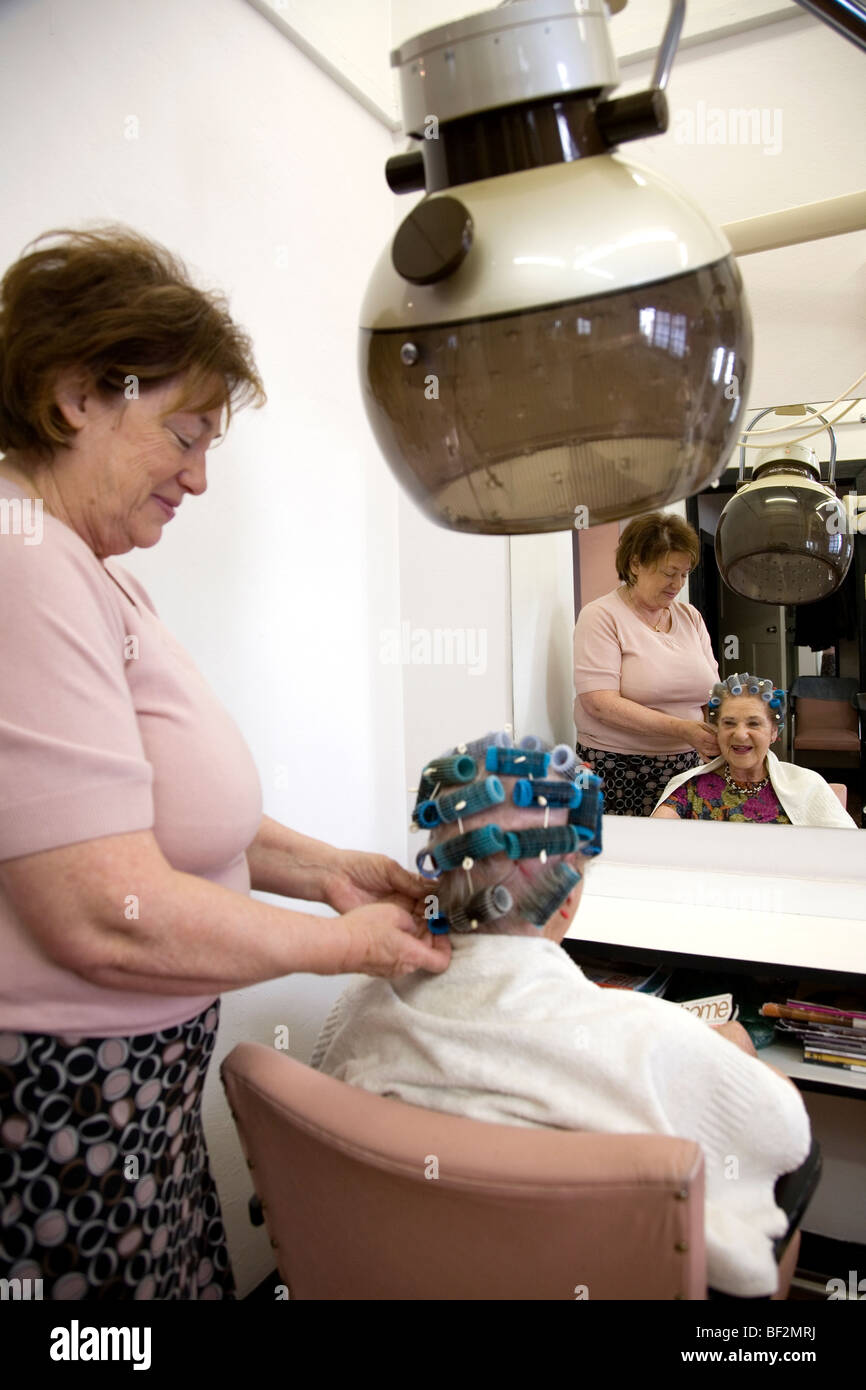 Stylist and Client at The Old Hair Salon Stock Photo - Alamy
