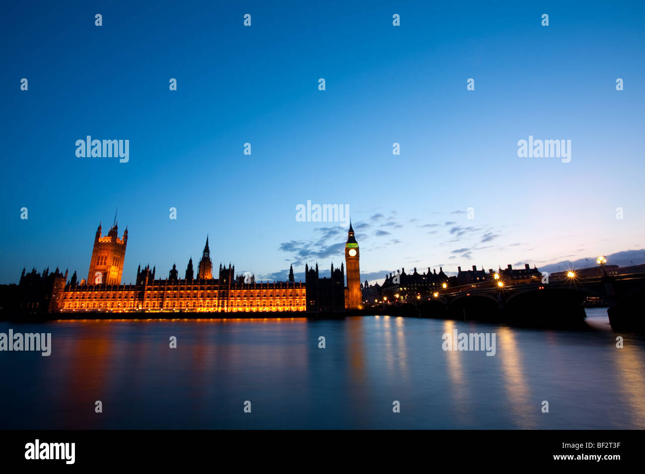 Night shot of the Houses of Parliament over the Thames Stock Photo