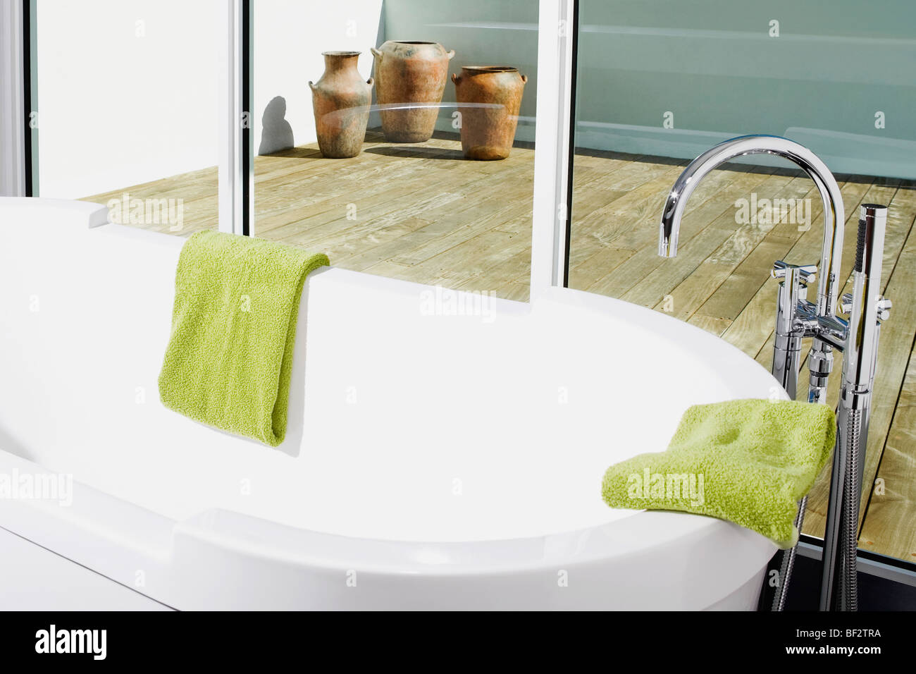 Bathtub in the bathroom Stock Photo Alamy