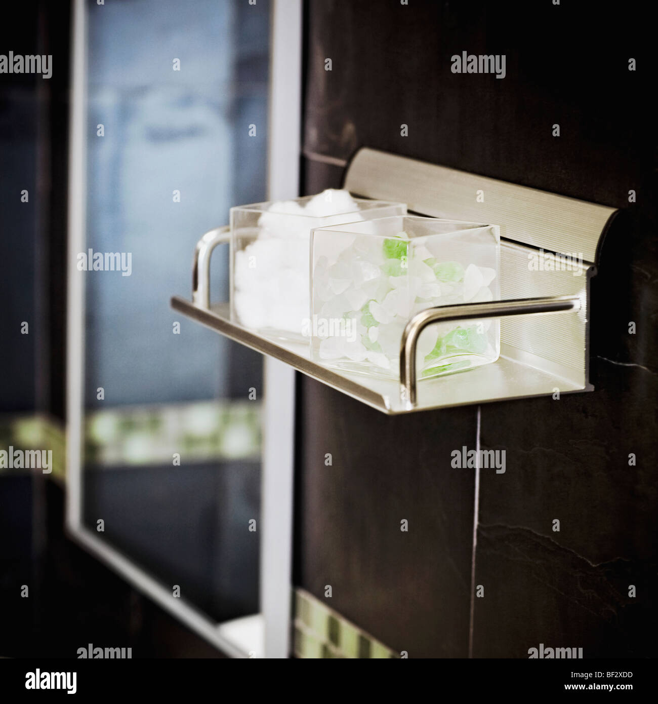 Toiletries on a rack in the bathroom Stock Photo Alamy