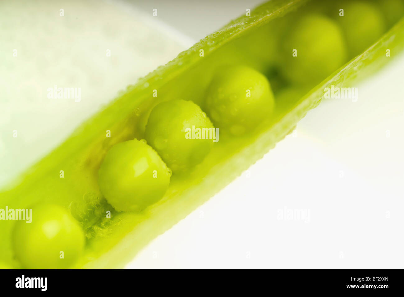 Close-up of peas in a pod Stock Photo