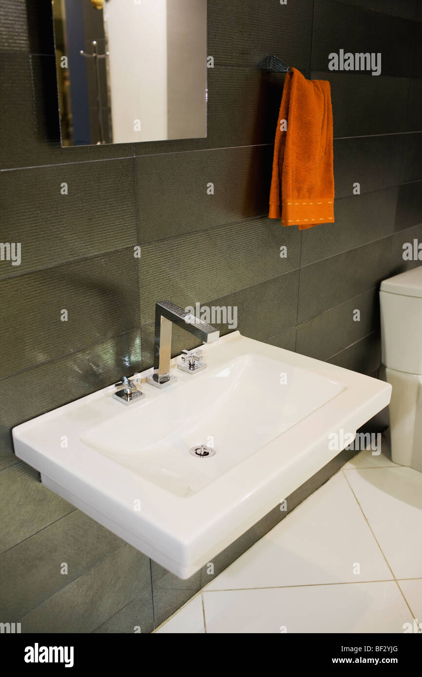 Close-up of a washbasin in the bathroom Stock Photo - Alamy