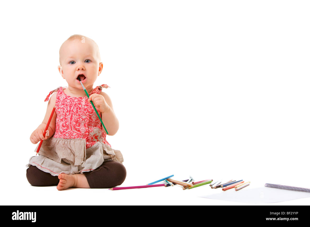 Portrait of very cute baby girl holding painting brush Stock Photo ...