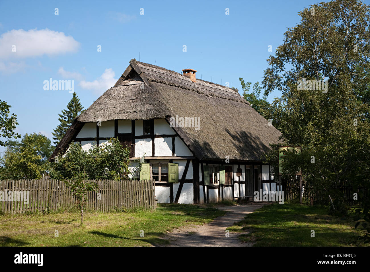 Timbered thatched homestead Kluki open air museum Poland Stock Photo