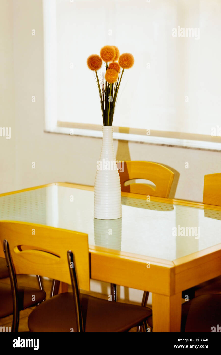 Flower vase on a dining table Stock Photo Alamy