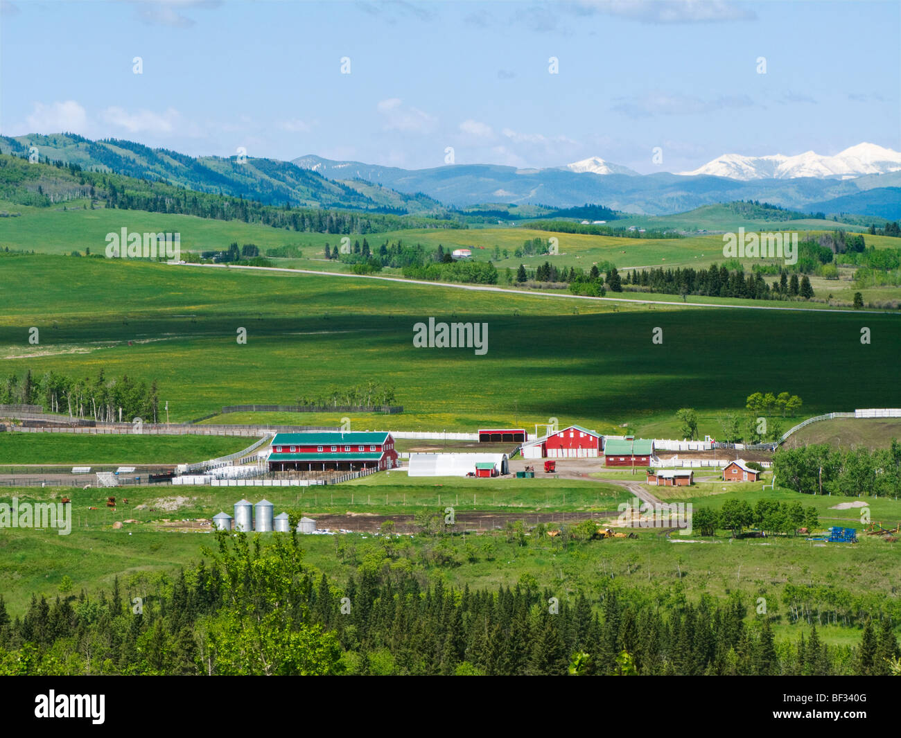 Ranch buildings including barns, corrals & out buildings in the foothills along the Rocky Mountain Front Range / Alberta, Canada Stock Photo