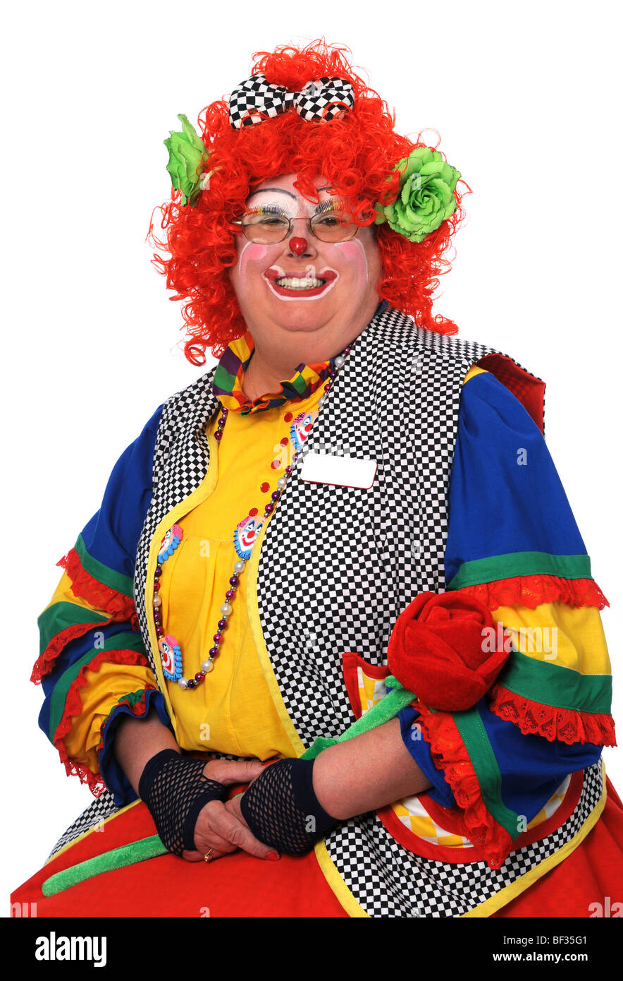 Female clown with colorful attire smiling Stock Photo - Alamy