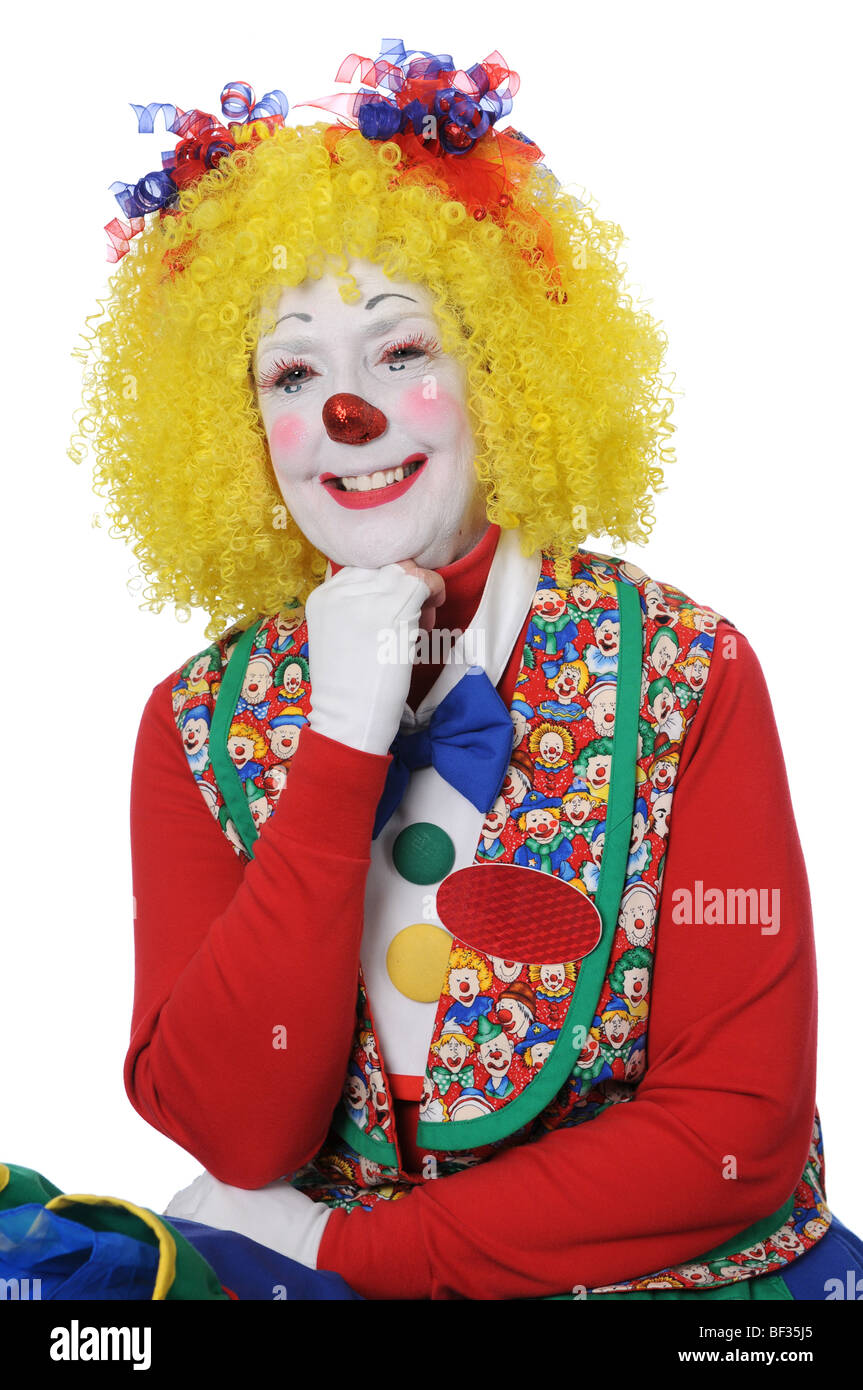 Clown with yellow hair smiling isolated over a white background Stock ...