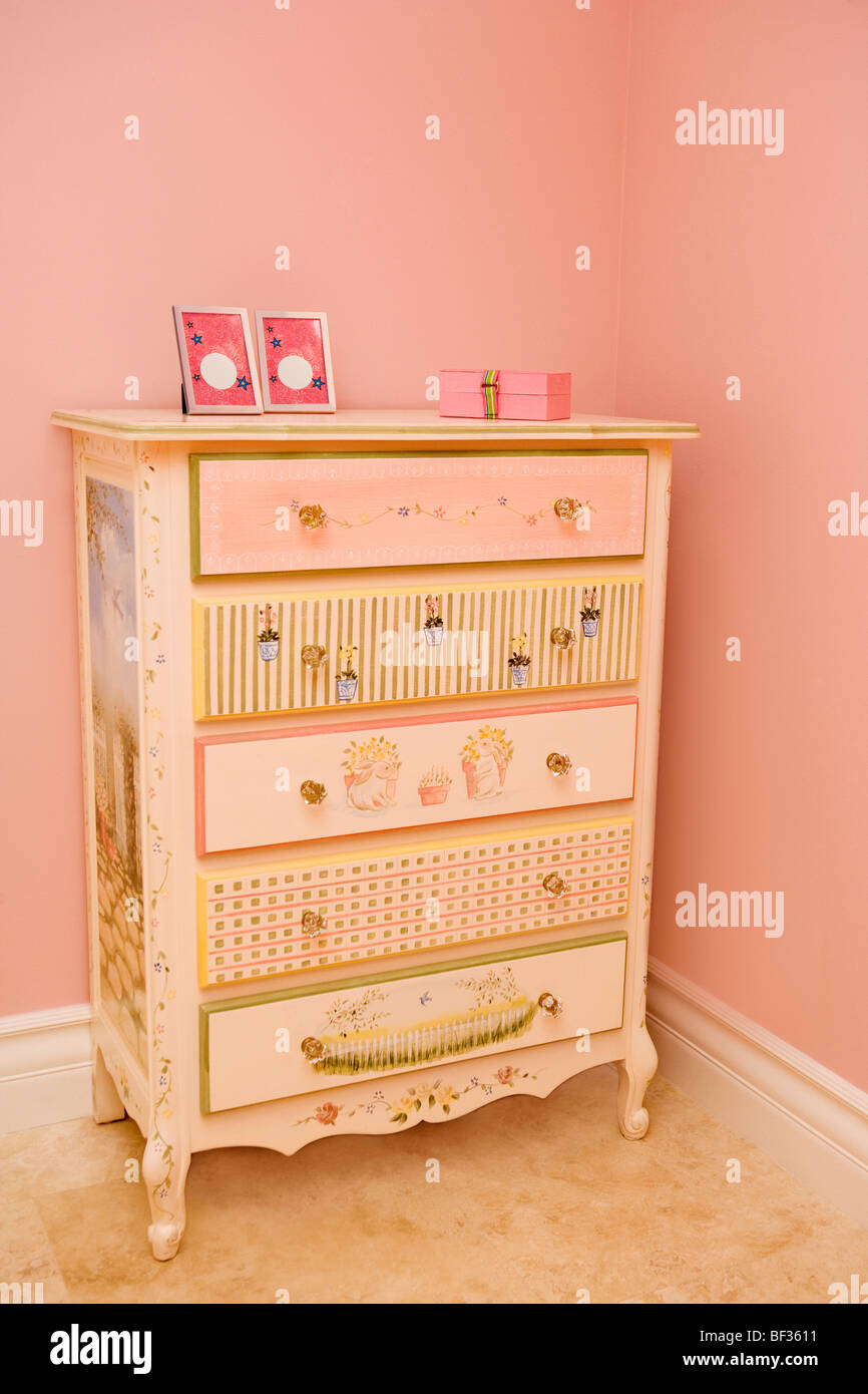 Picture frames with a box on a sideboard Stock Photo Alamy