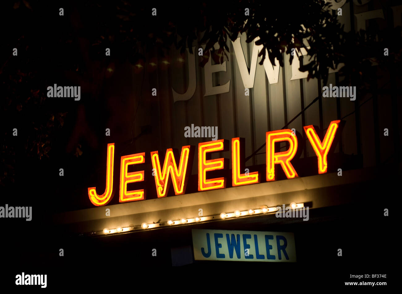 Neon jewelry sign over a the storefront of a jeweler Stock Photo Alamy