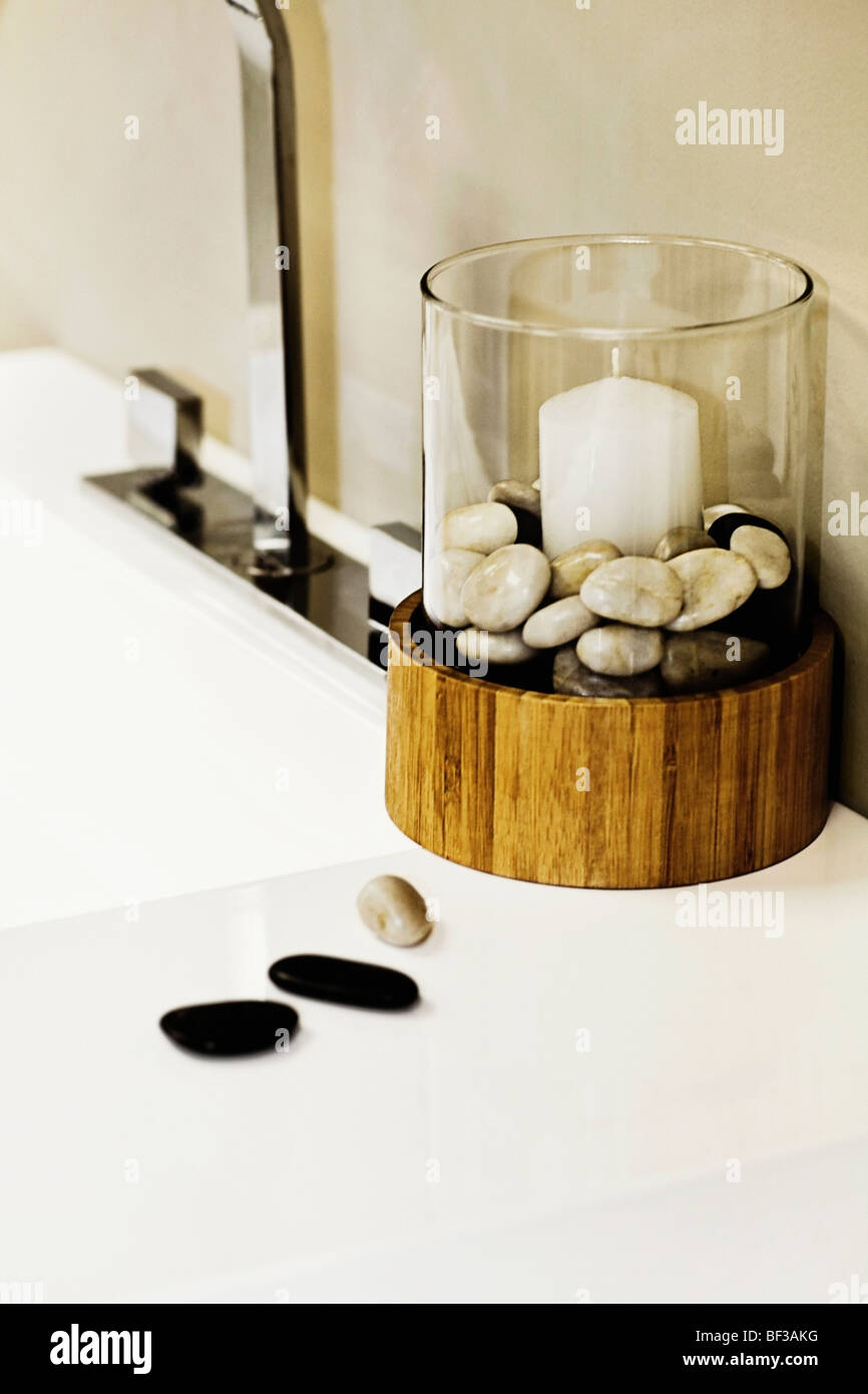 Candle on a bathroom sink Stock Photo Alamy