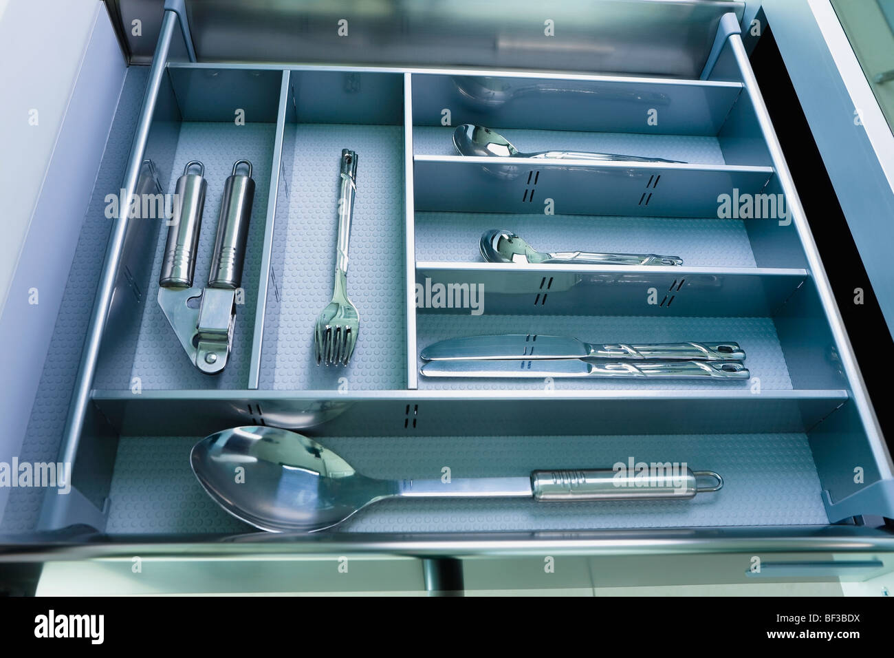 Kitchen utensils in a drawer Stock Photo - Alamy