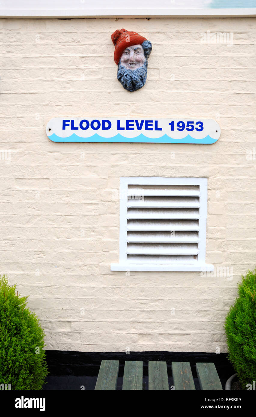 Southwold, Suffolk, England, UK. The Harbour Inn. Sign on outside wall showing flood level from 1953 Stock Photo