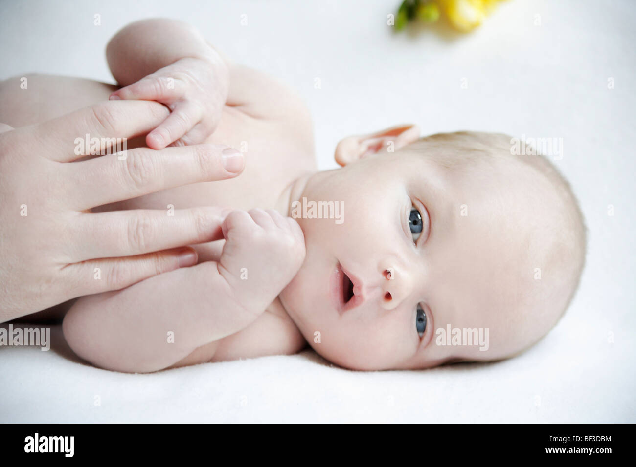 Самопроизвольная улыбка у новорожденных. Улыбка новорожденных. A baby with a pacifier in his hand. Regret песня. Begging baby.