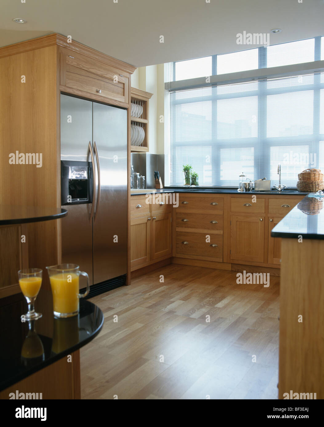 Wooden flooring and stainless steel Americanstyle refrigerator in