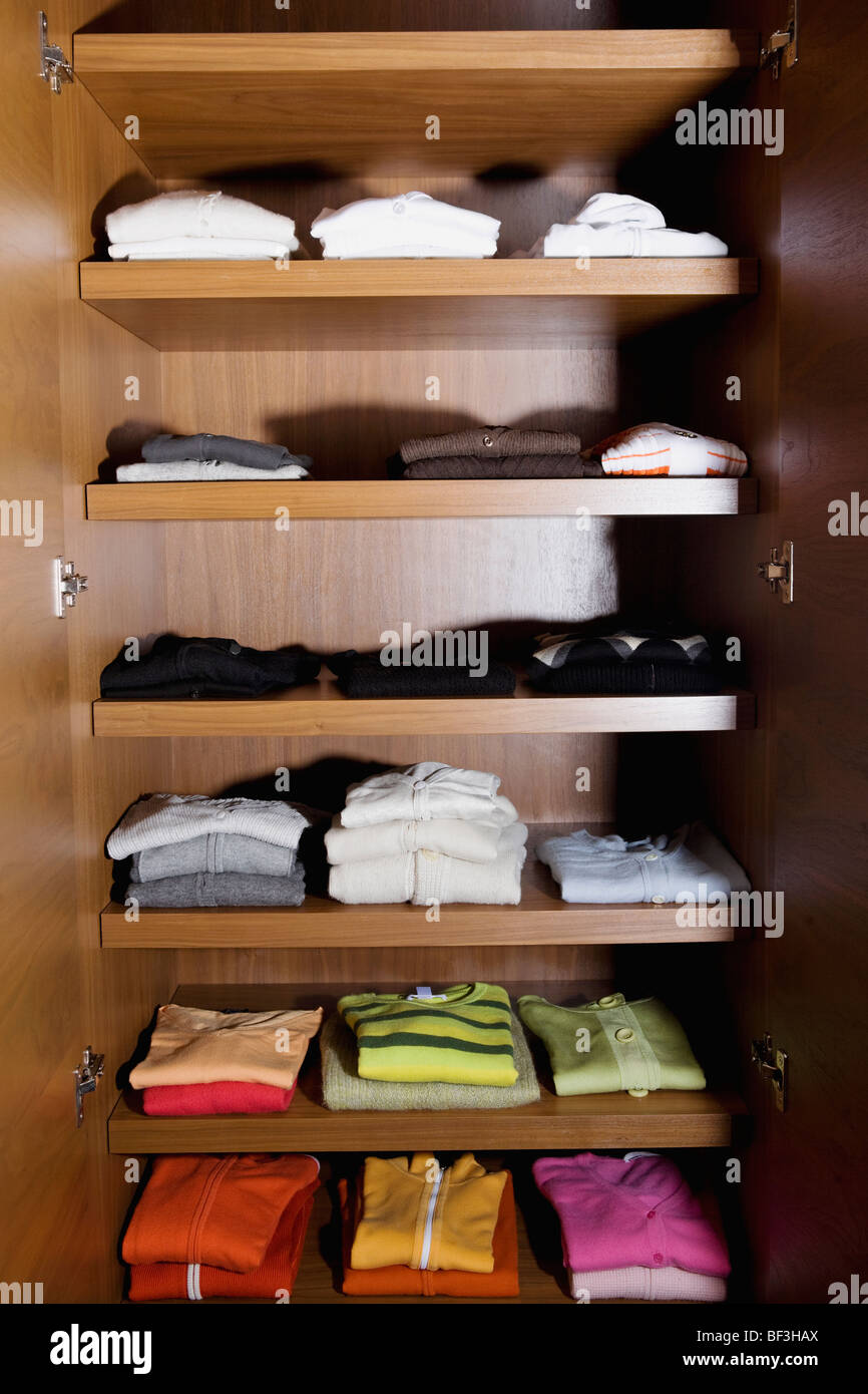 Clothes on shelves Stock Photo