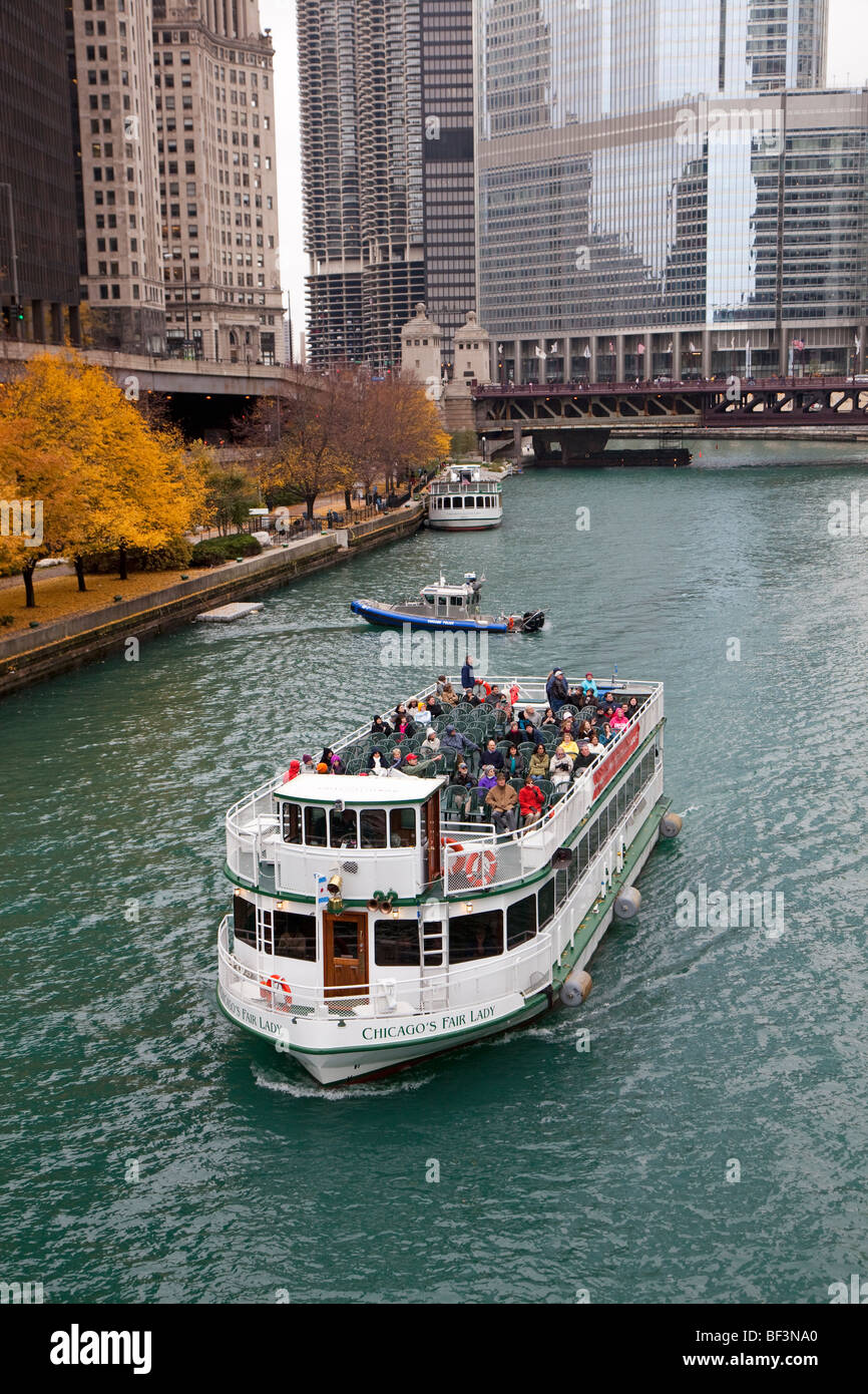 Chicago, Illinois Tourists on a boat on the Chicago River get an