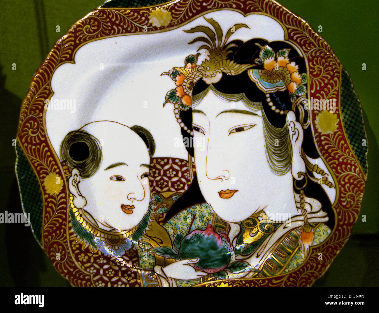 porcelain  women baby Satsuma 19 th C Japan Japanese Stock Photo