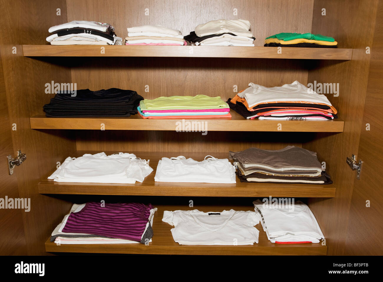 Clothes on shelves Stock Photo