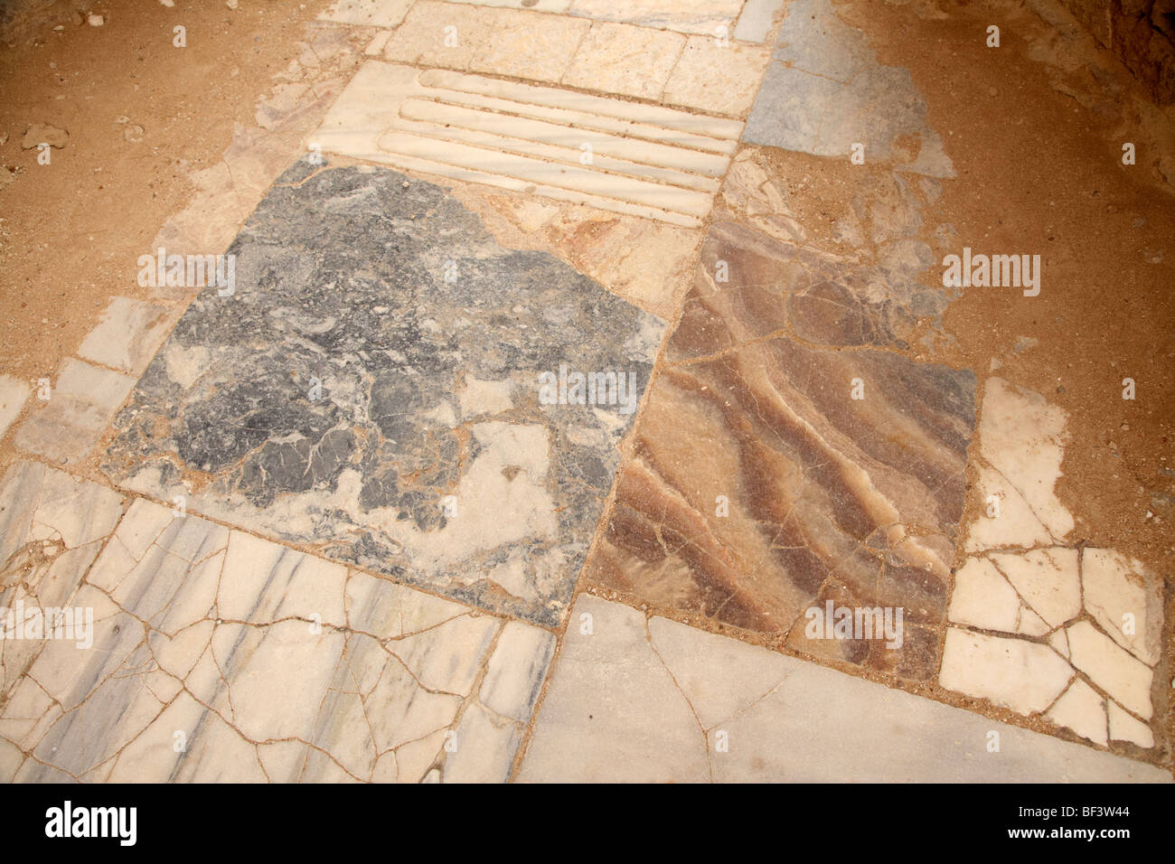 marble tiles on the sudatorium floor in the gymnasium and baths in the ancient site of old roman villa salamis famagusta Stock Photo