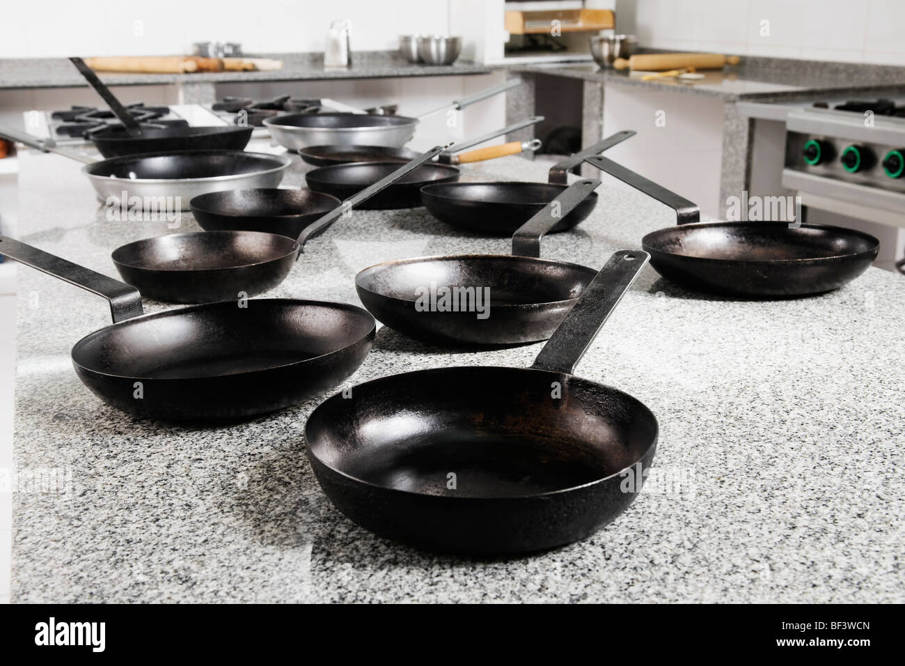 Frying pans in the kitchen Stock Photo Alamy