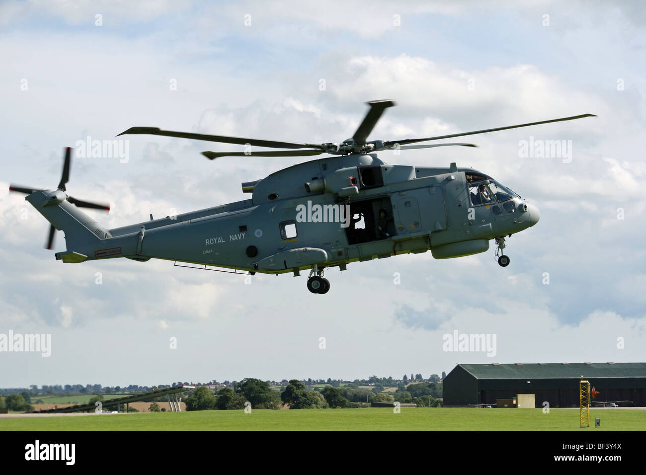 The UK Royal Navy Merlin medium lift helicopter is a variant of the