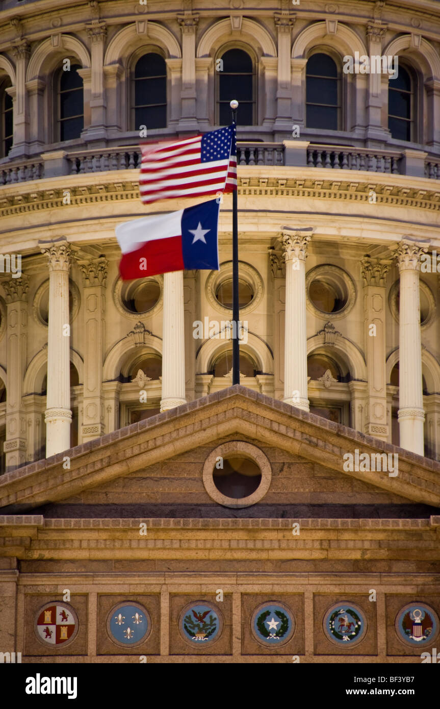 Texas State Capitol building at night with American flag and Texas flag. Stock Photo