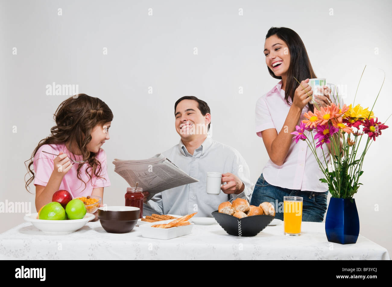 Family at the breakfast table Stock Photo - Alamy