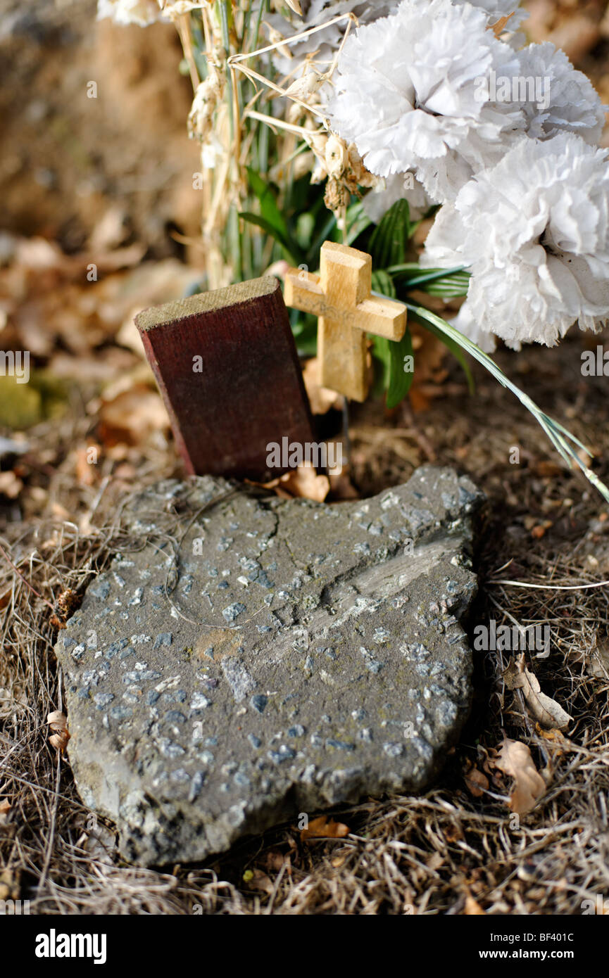 A child's grave with piece of road tarmac from apparent road accident. London. UK 2009. Stock Photo