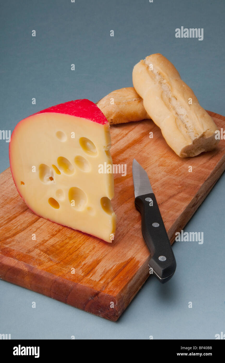 Edam cheese with crusty bread Stock Photo