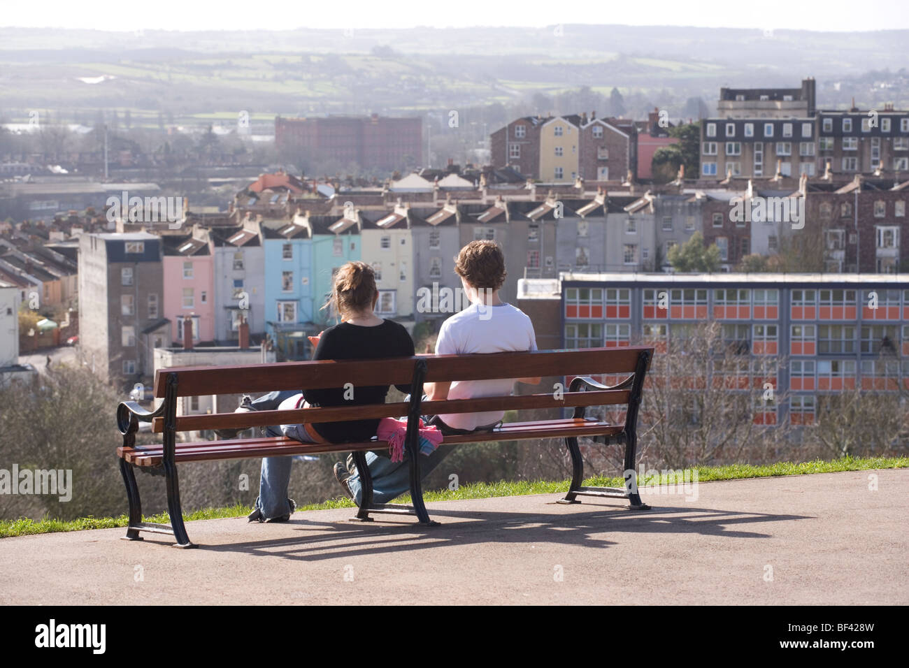 A young couple stop for lunch on Brandon Hill, which has fine views over the city and beyond Stock Photo