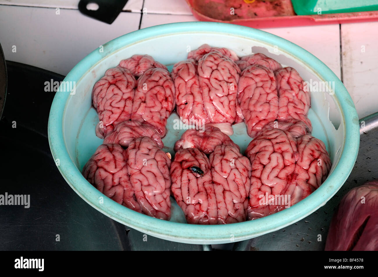 meat products offal organ organs brains brain produce food on sale market ho chi minh vietnam asia unsanitary conditions Ben Tha Stock Photo