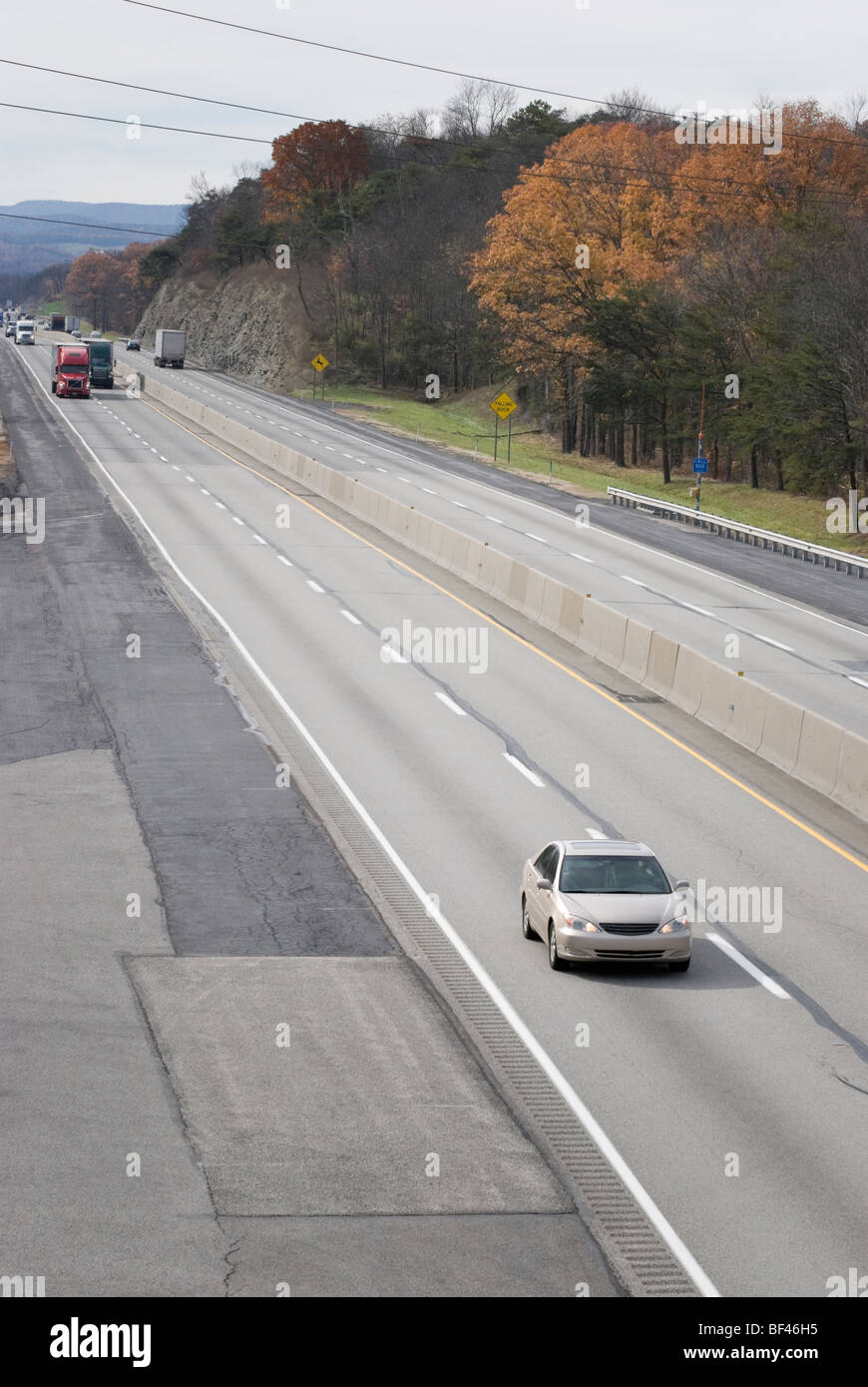 Car traveling on the Pennsylvania Turnpike, and American interstate highway. Stock Photo