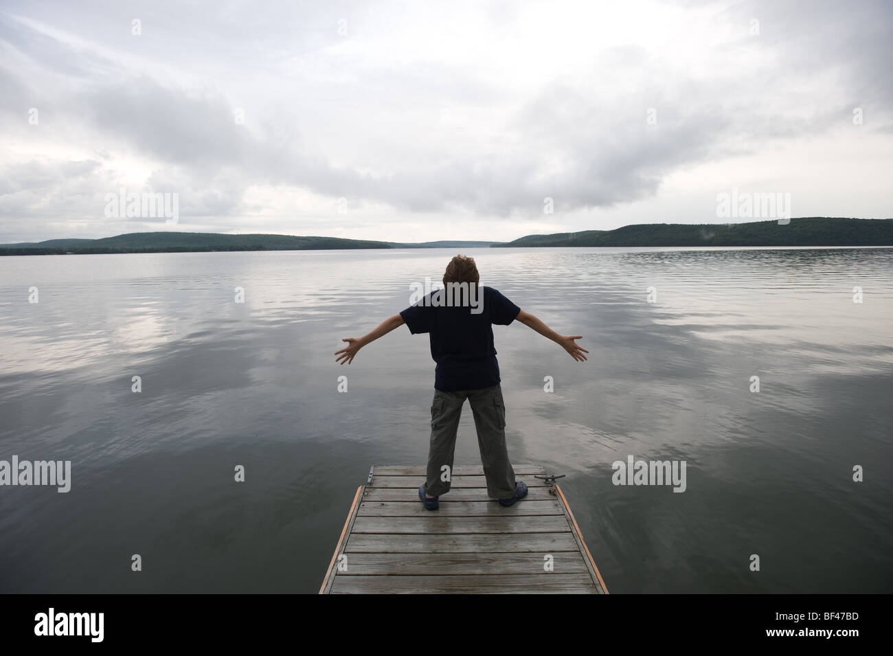 Boy on Long Lake Maine Stock Photo