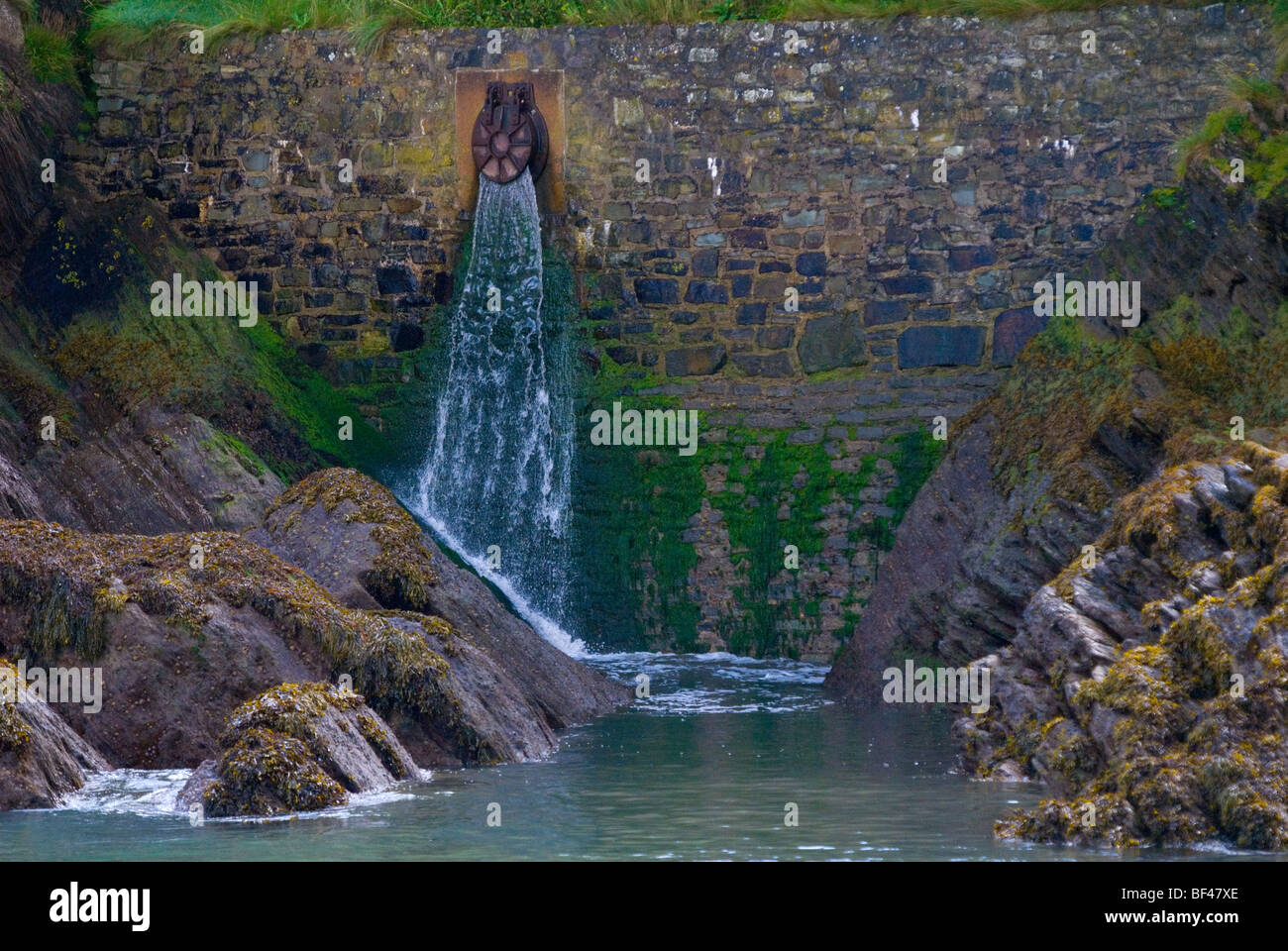 A Strom Drain Outflow in Ilfracombe Harbour North Devon Stock Photo - Alamy