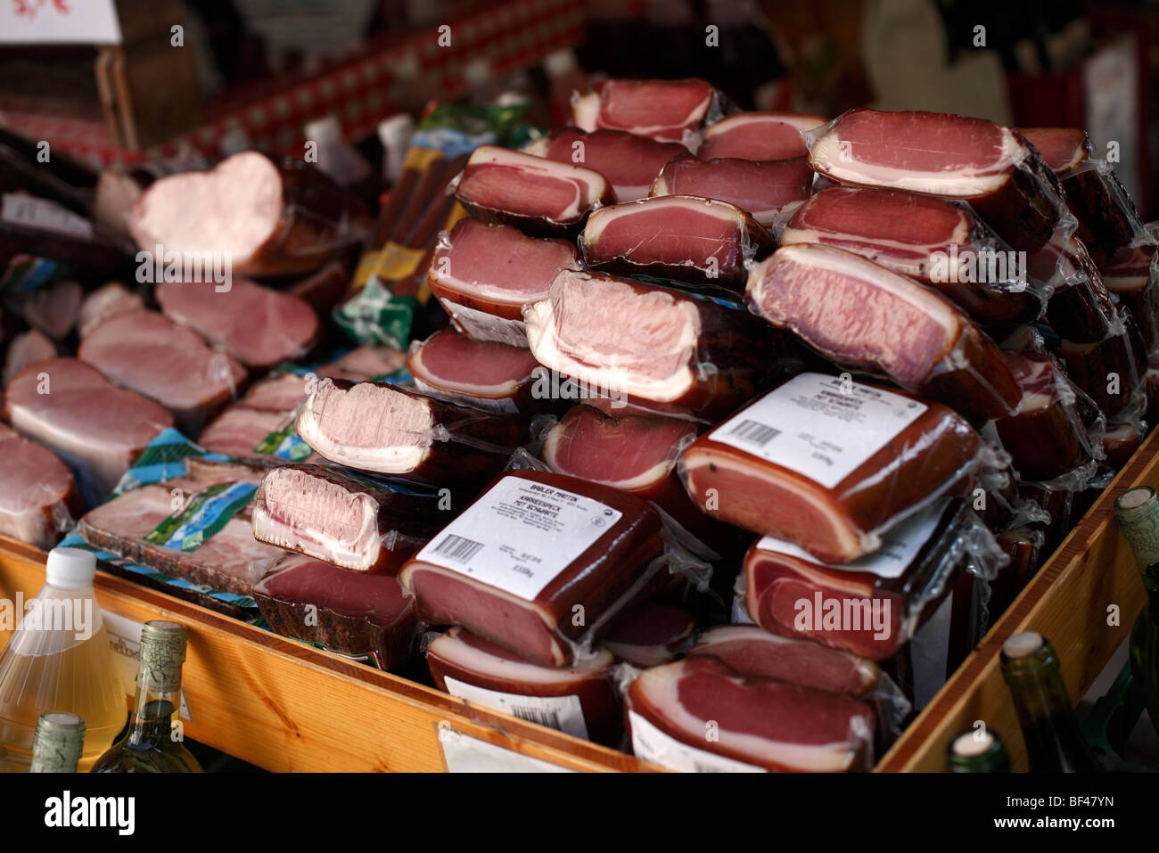 Cured meat on sale on a market stall in Germany Stock Photo Alamy
