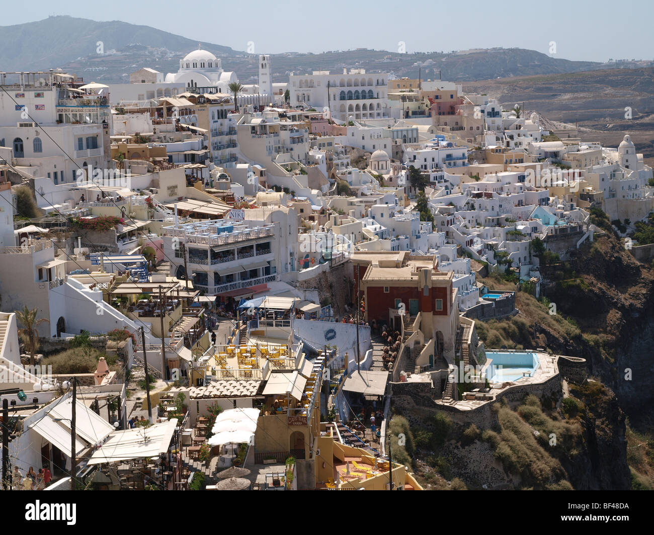 The village of Fira or Thira on the edge of the caldera on the Greek Island of Santorini Greece Stock Photo
