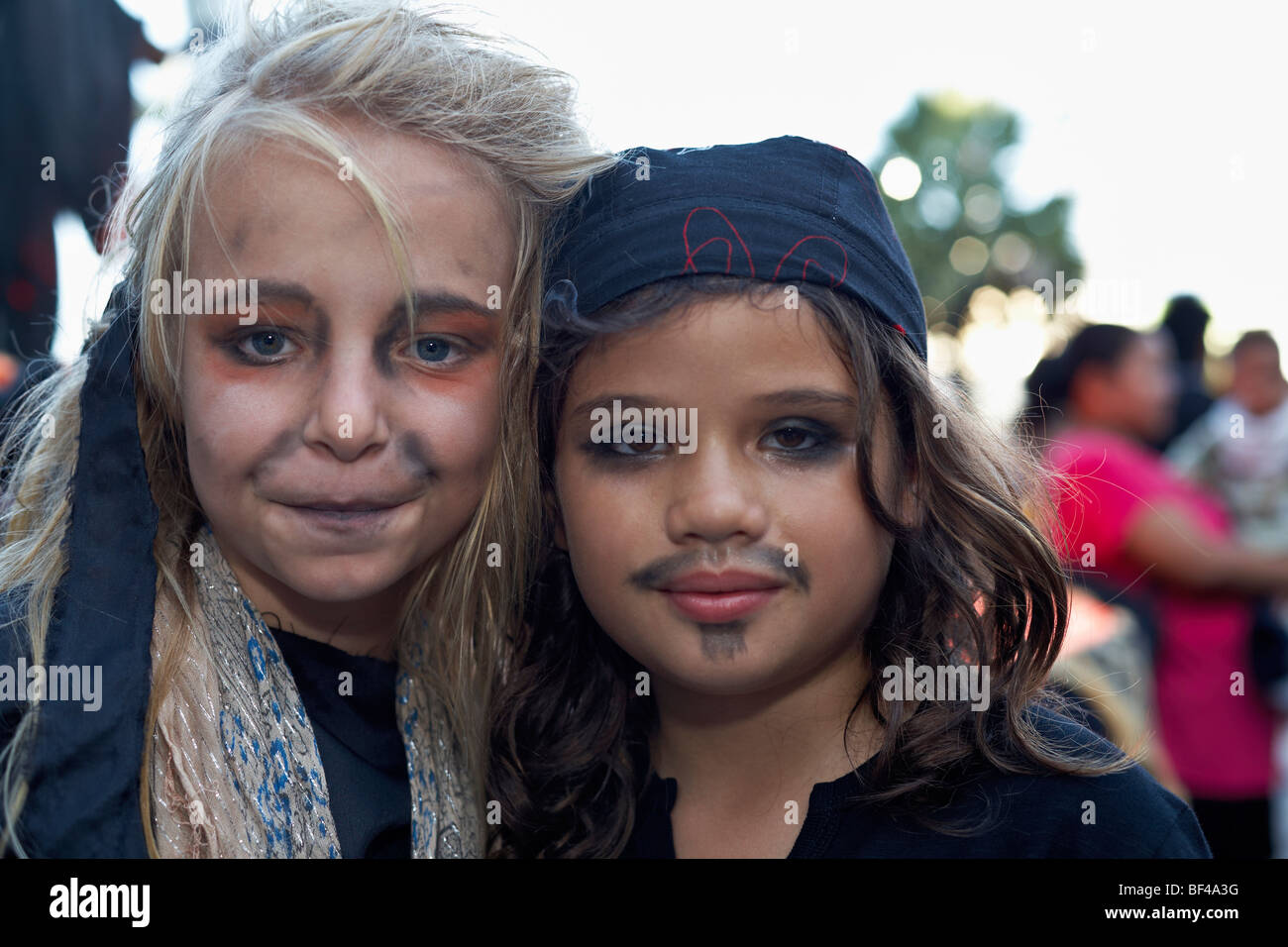 Halloween Children dressed as pirates with appropriate face make up at a Halloween festival Stock Photo
