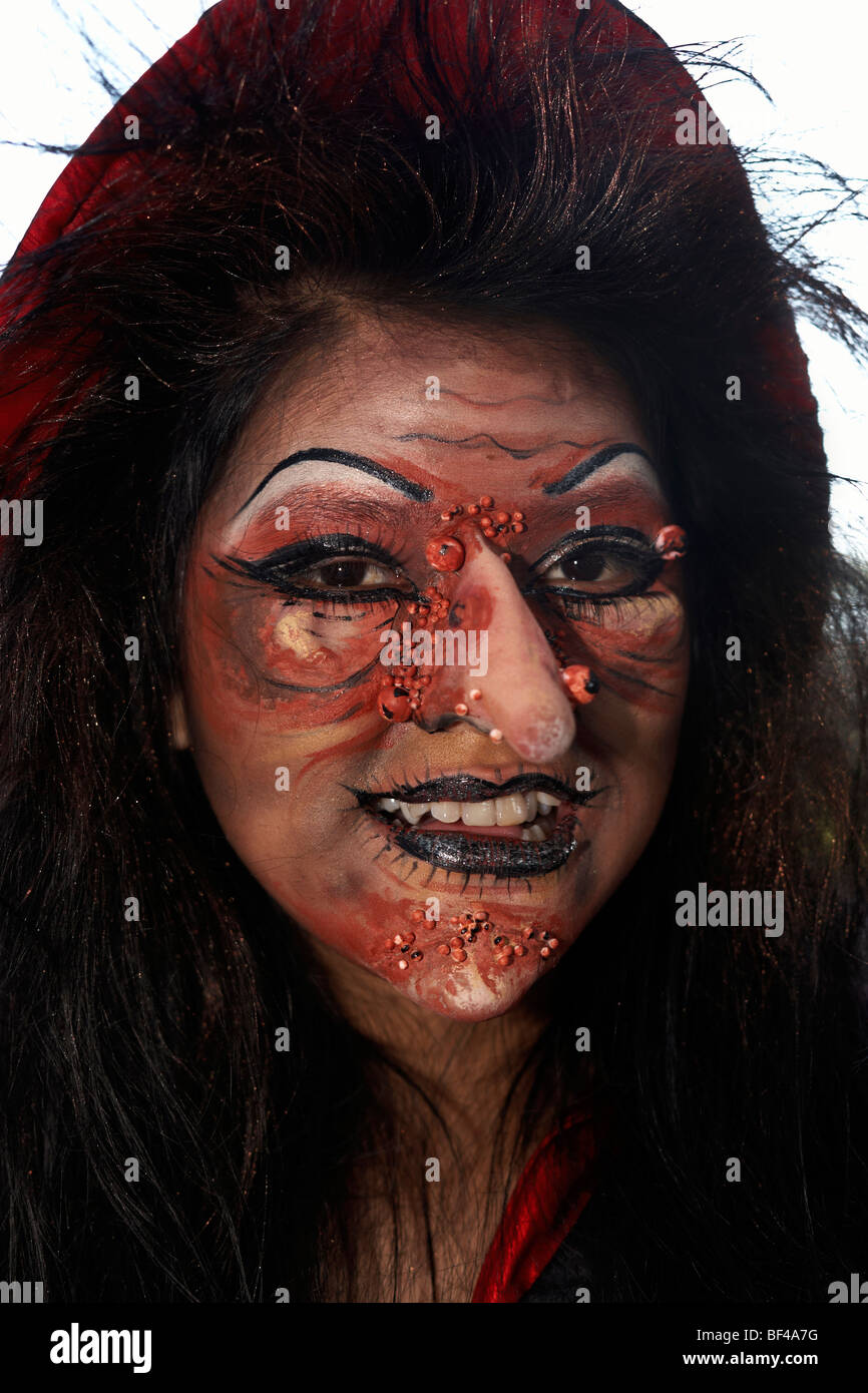 Full face make up "warts and all" for a Halloween witch Stock Photo