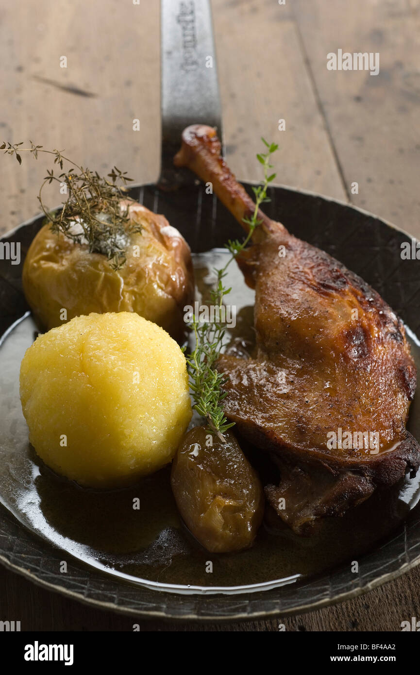 Goose leg 'Norman style' with thyme apple and cidre sauce Stock Photo