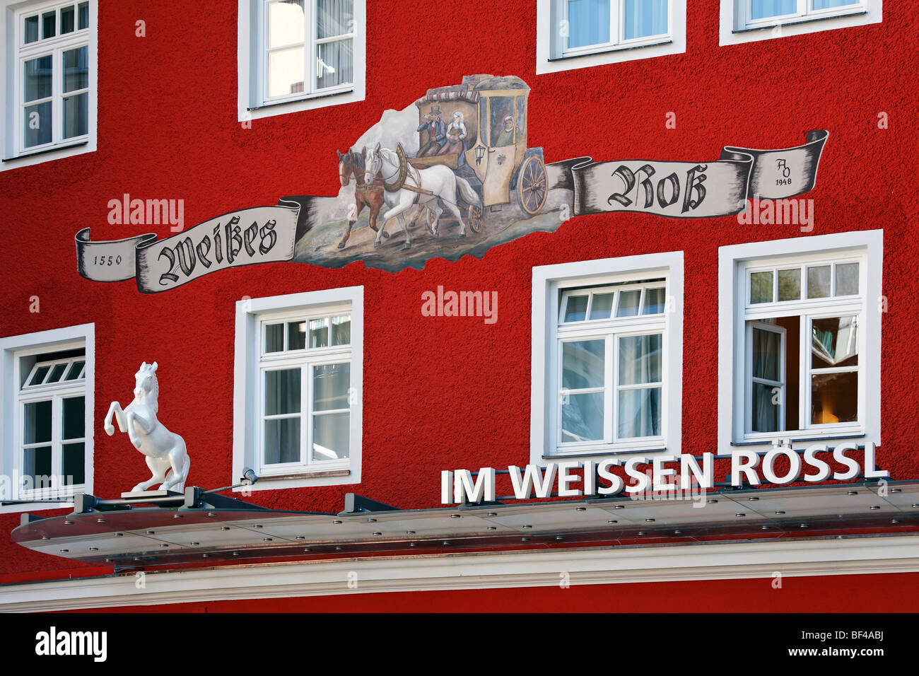 Im Weissen Roessl, lettering and horse figure on the facade, famous hotel, St. Wolfgang on the Wolfgangsee lake, Salzkammergut  Stock Photo