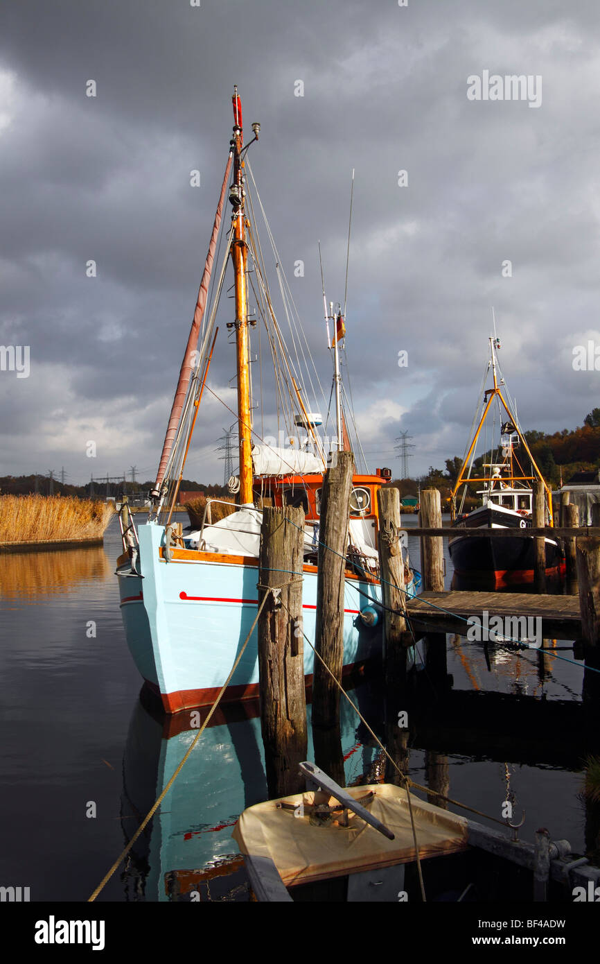 Fishing boats in the little harbour of Gothmund at the Trave river, hanseatic city of Luebeck, Schleswig-Holstein, Germany, Eur Stock Photo