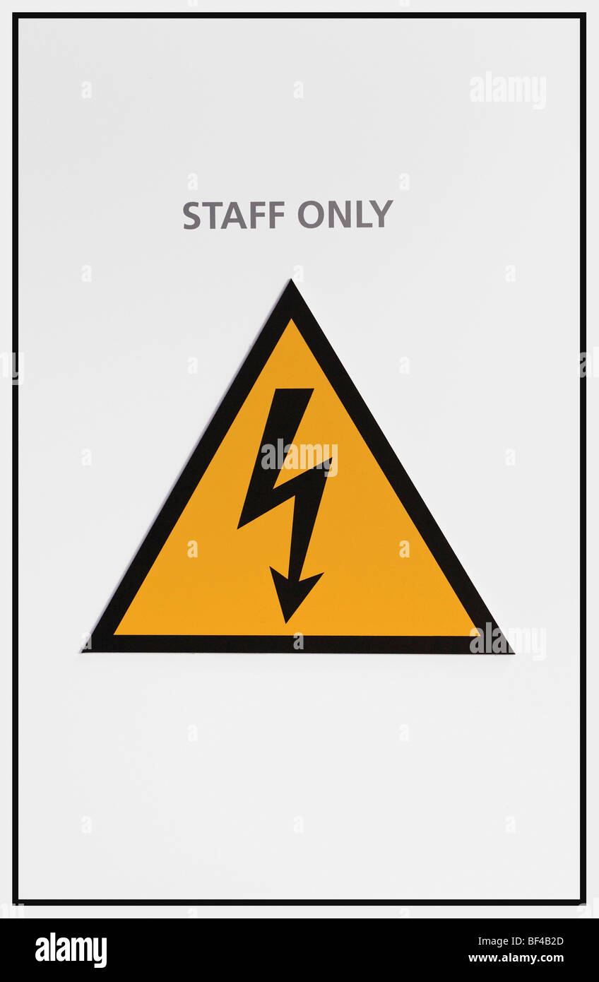 Warning sign, staff only, warning of dangerous electrical voltage Stock  Photo - Alamy