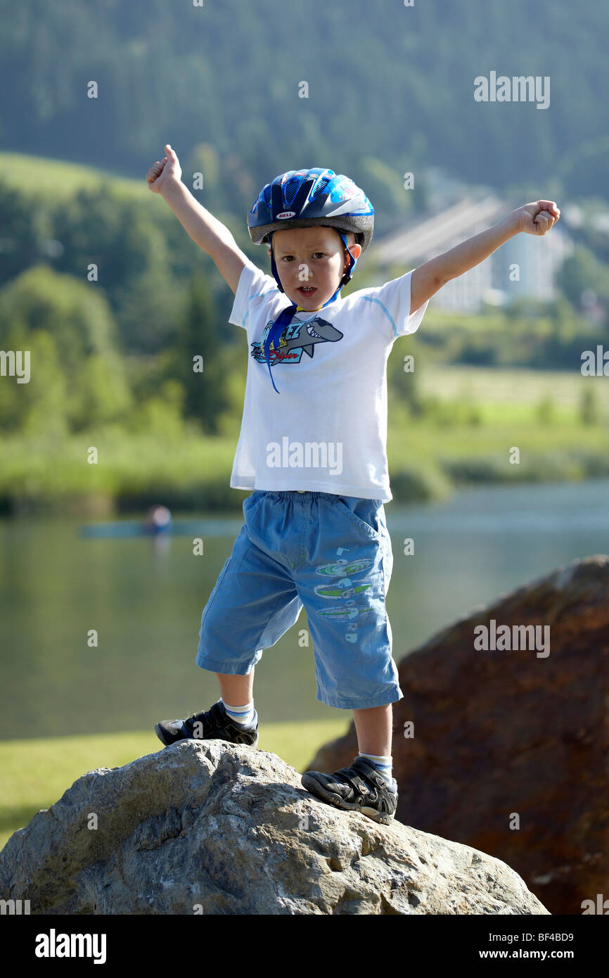Child, posing as winner, Carinthia, Austria, Europe Stock Photo