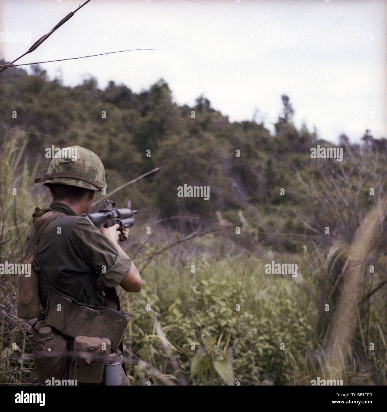 An Infantryman Of B Troop 1st Squadron 9th Cavalry Fires An M16 At A An Infantryman Of B Troop 1st Squadron 9th Cavalry Fires An M16 At A