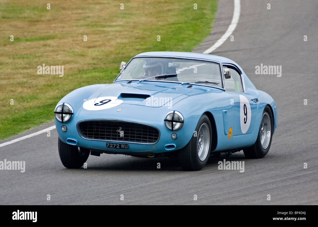 1960 Ferrari 250 GT SWB/C with driver Marc Devis at the 2009 Goodwood Revival, Sussex, UK. Stock Photo