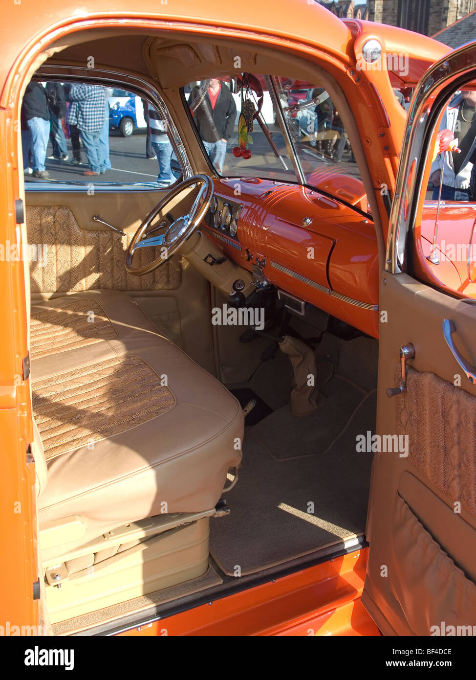 The drivers cab of an orange classic American pick-up Custom car with snakeskin seats at the Whitby Goth Week End 2009 Stock Photo